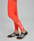 Legging Assimétrica Listras e Bolsos