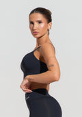 Conjunto Top e Calça Fitness Feminino Com Recortes Preto Básico Dlk