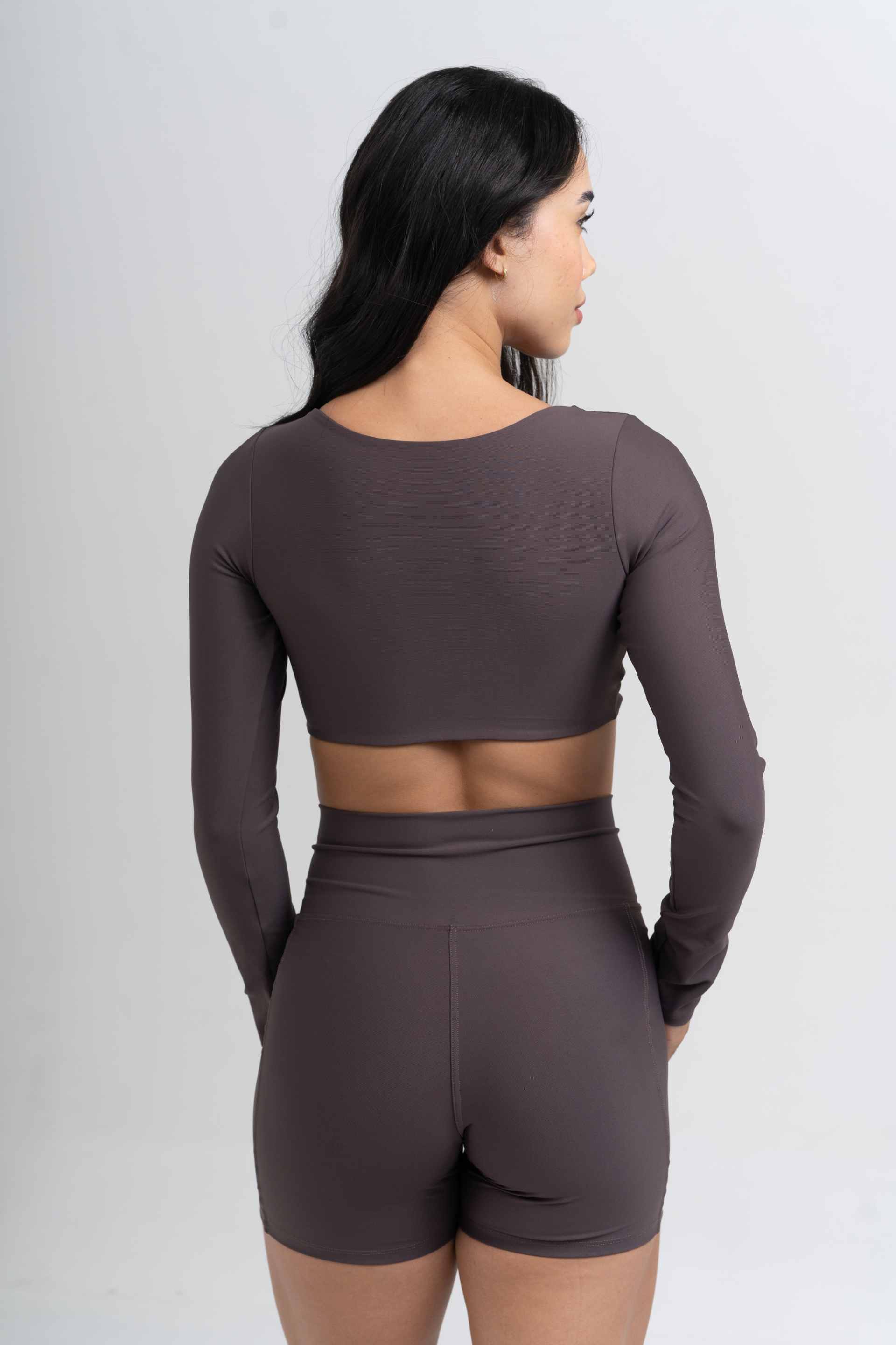 Conjunto Top e Calça Fitness Compressão Manga Longa Infinity Marrom Carbono